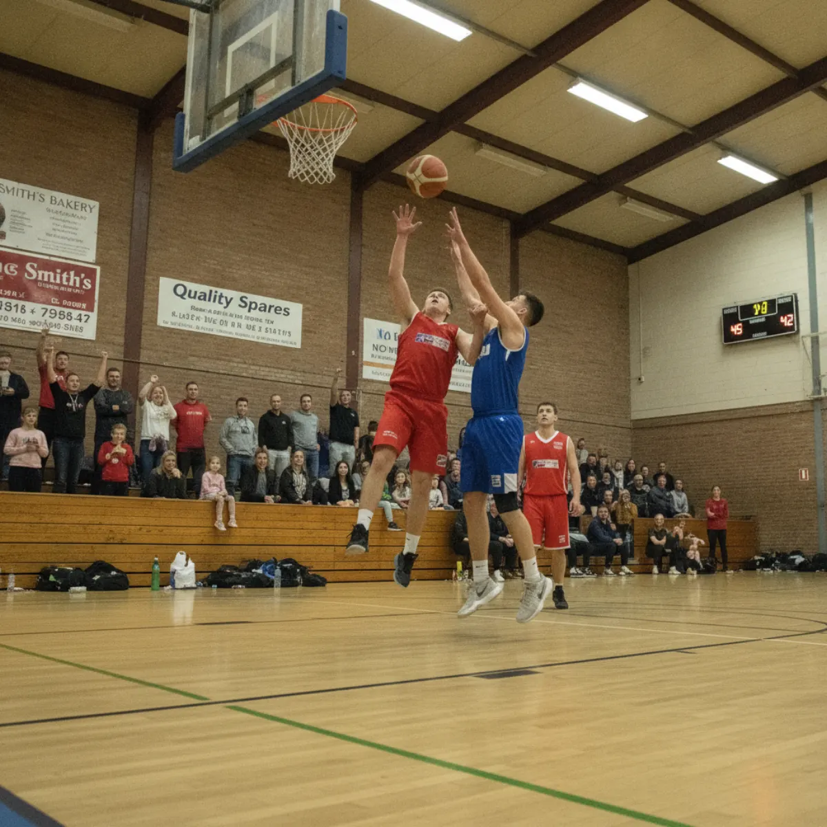 Amateur basketball tournament in a community sports hall